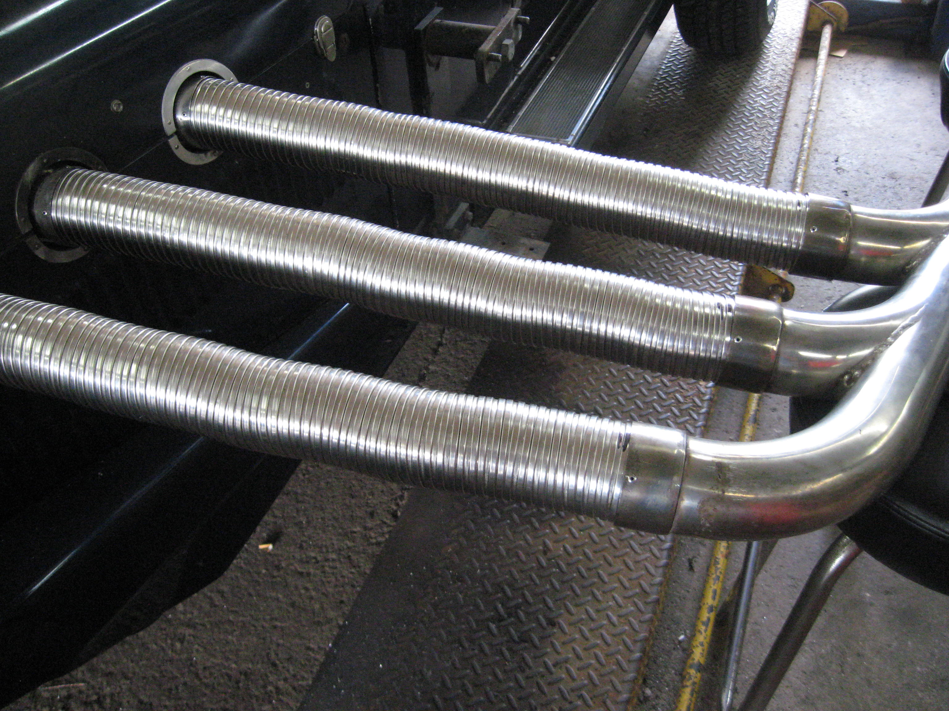 Automotive Exhaust Specialists work